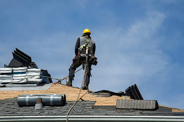 Professional Gutter Installation technician working in Mantoloking, NJ
